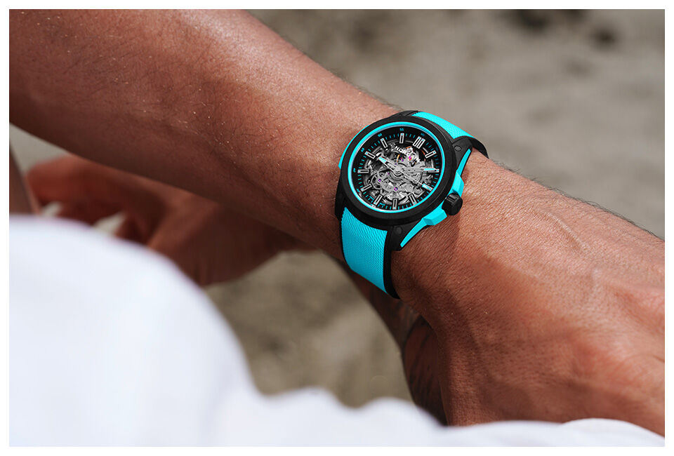 Close-up of NORQAIN skeleton watch with green rubber strap &ndash; innovative and lightweight performance watch